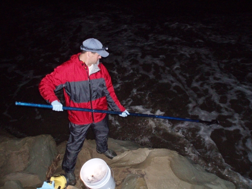 Tommy Liddell taking a grab sample at the Santa Clara River Mass Emission Monitoring Site (Dec. 2006)